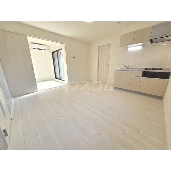 ハーモニーテラス 中村公園ヒルズの居間写真