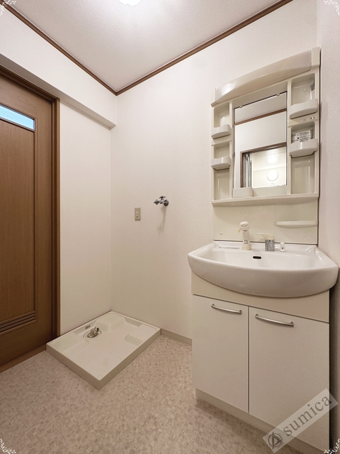 洗面設備　※４０３号室・リフォーム前の写真となります。