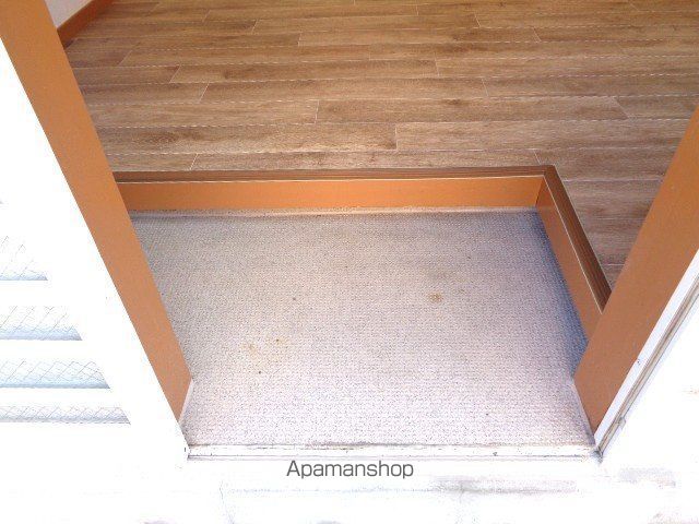 山形市 2階建 築35年の玄関写真