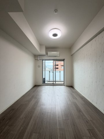 プレサンス堺筋本町センティスの居間写真