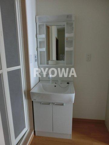 洗面設備　掲載の写真は退去前の写真となります。