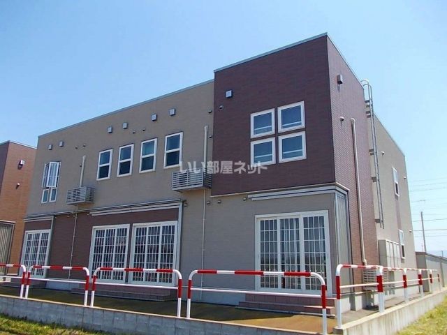 妙高市柳井田町のアパートの建物外観