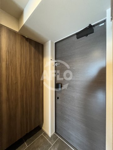 玄関　ザ・パークハビオ塚本　玄関