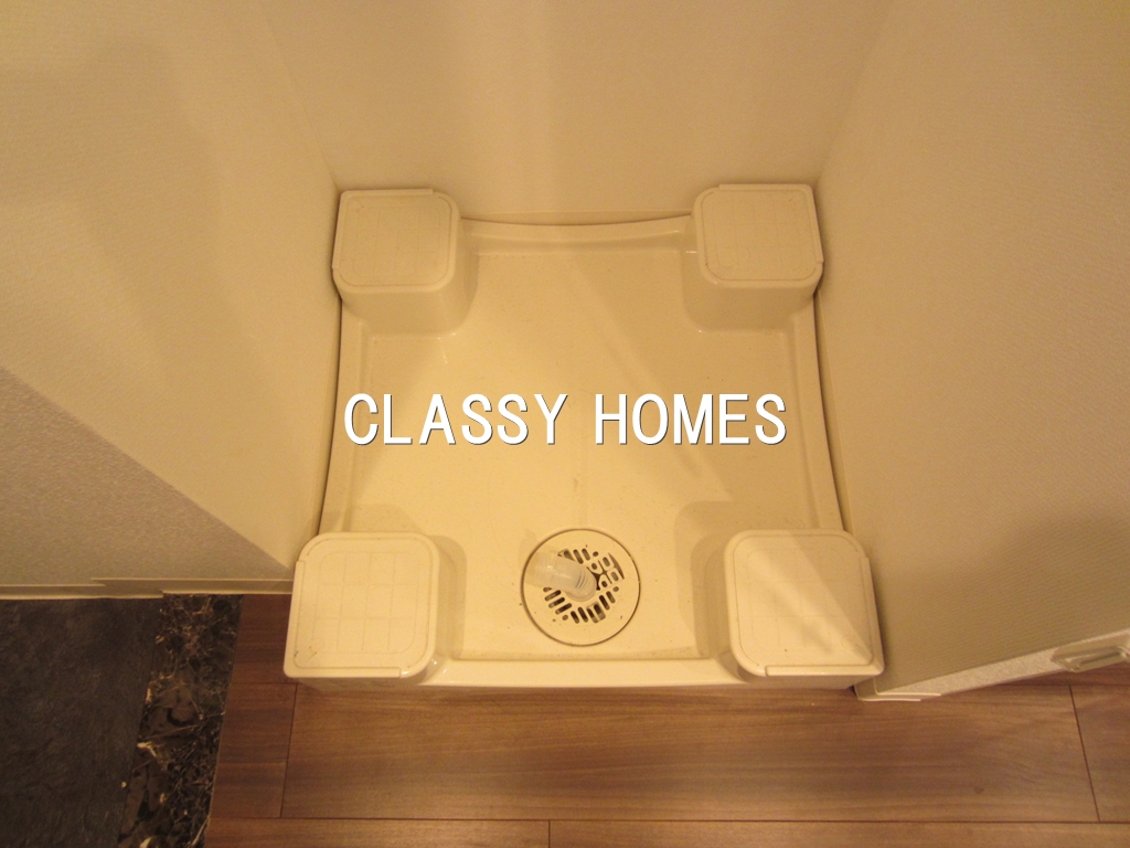 その他設備　2012年竣工　分譲マンション：洗濯機置き場