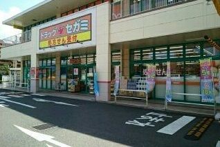 ドラックストア　ドラッグセガミ上野芝楽市店（ドラッグストア）まで950m