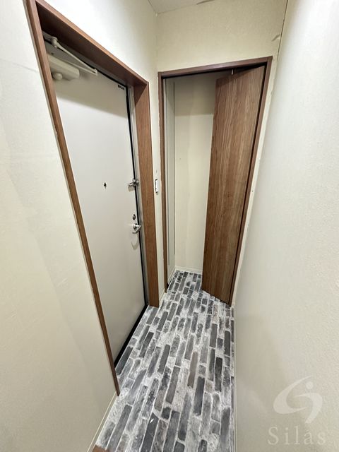 京阪本線 萱島駅 徒歩9分 3階建 築8年の玄関写真