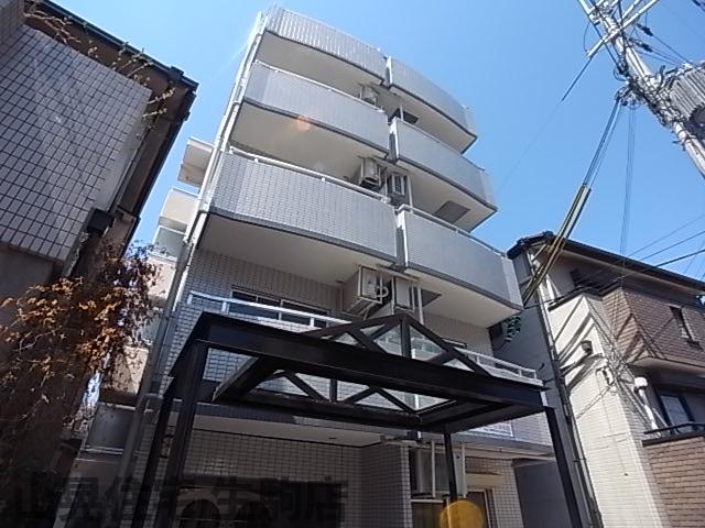 生駒市山崎新町のマンションの建物外観