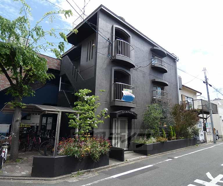 京都市南区西九条南田町のマンションの建物外観