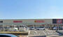 ドラックストア　サンドラッグ岸和田北町店（ドラッグストア）まで885m