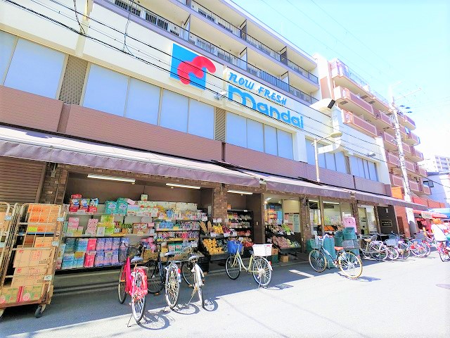 スーパー　万代塚本店（スーパー）まで329m