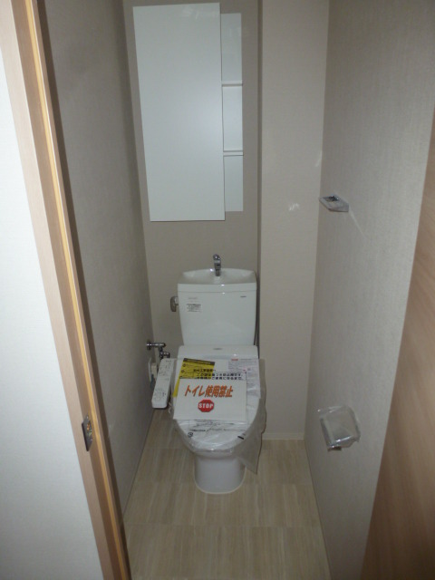 トイレ　同仕様別号室の写真です。