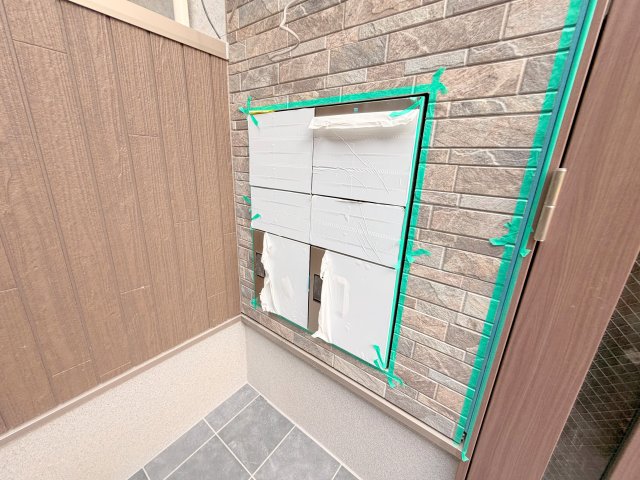 ロビー　ロビーにある各部屋毎のメールボックス。