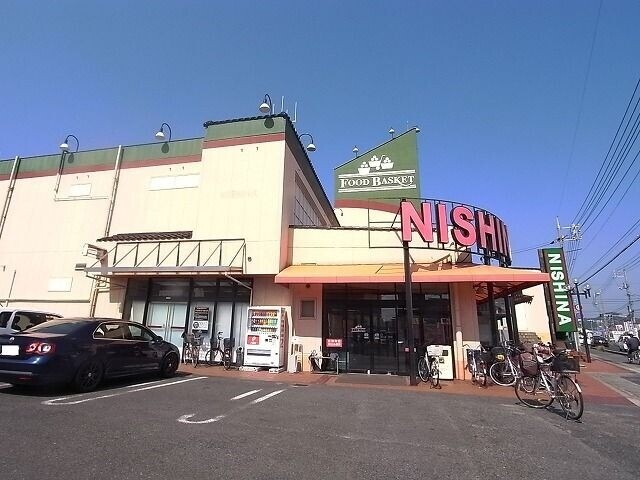 スーパー　ニシナフードバスケット　西阿知店（スーパー）まで591m