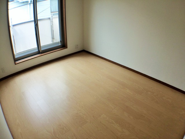 ワコーレヴィアーノ須磨関守町2丁目の居間写真