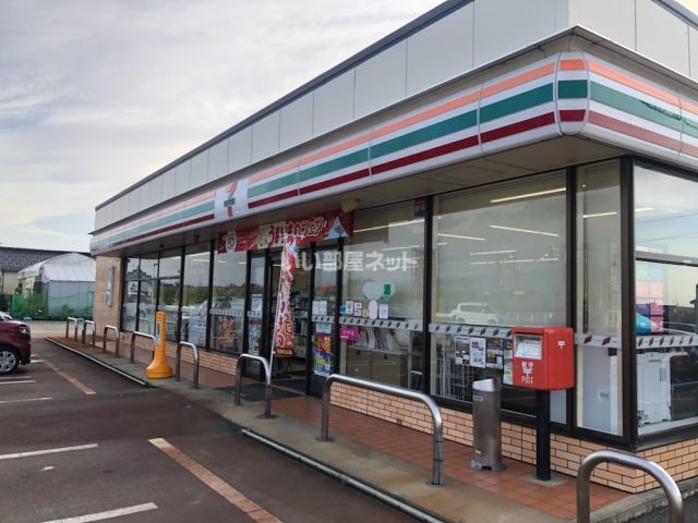 コンビニ　セブンイレブン　魚津持光寺店（コンビニ）まで1077m