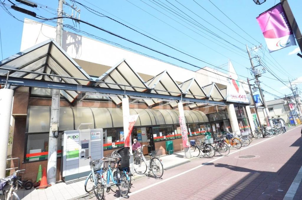 スーパー　コモディイイダ舎人店（スーパー）まで550m