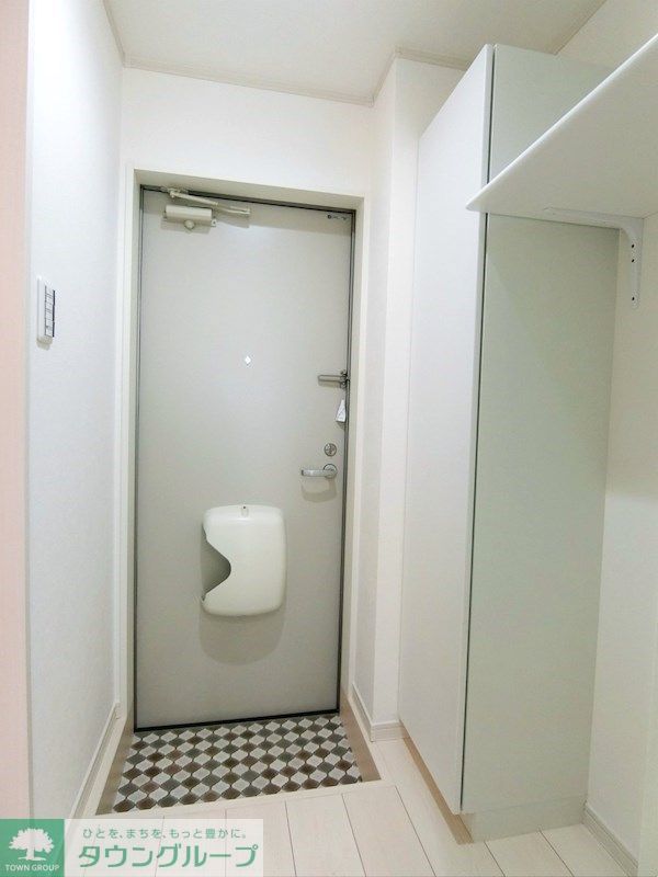 ハーミットクラブハウス石川町IVの玄関写真