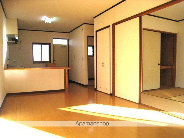 丸久第12コーポ A棟の居間写真