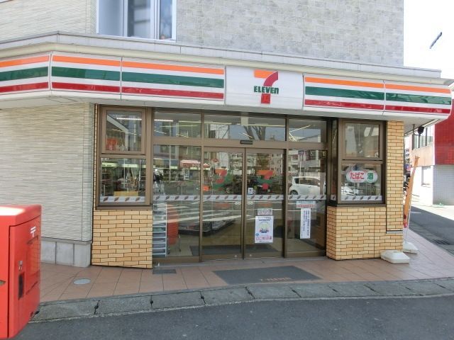 コンビニ　セブンイレブン松戸上本郷駅前店（コンビニ）まで210m