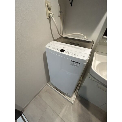 洗面設備　※写真は同じマンションの違う部屋のものになります。