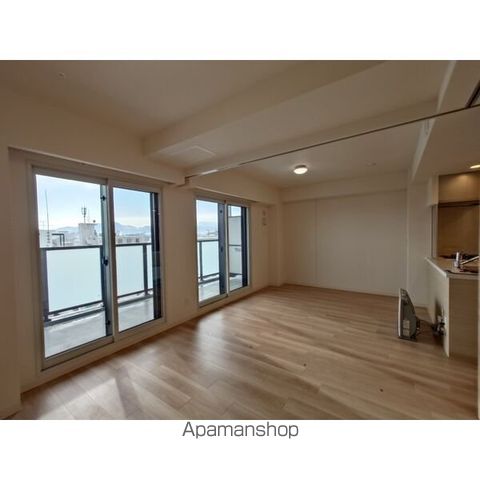 クリーンリバーフィネス北24条ステーションフロントの居間写真