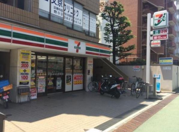 コンビニ　セブンイレブン文京千駄木1丁目店（コンビニ）まで128m