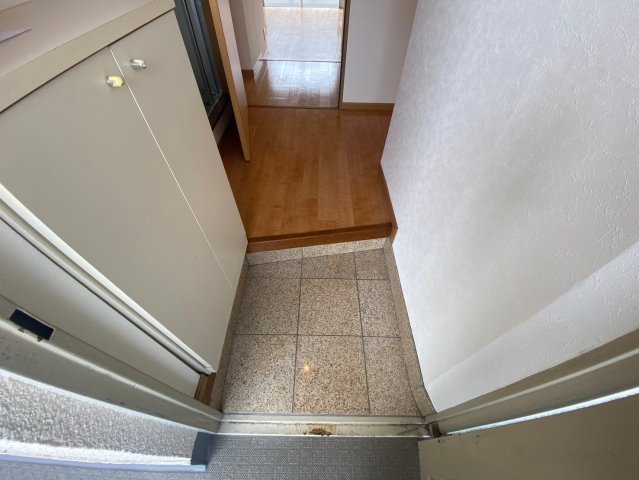 玄関　OS・SKYマンション鹿子