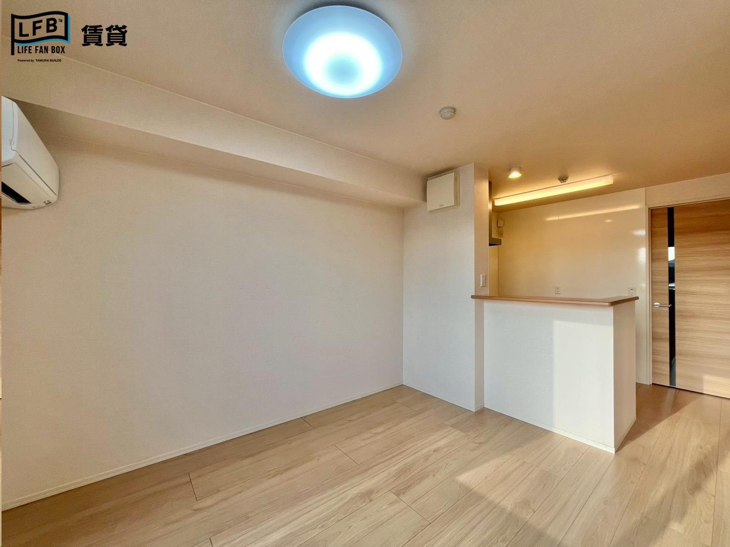 居室・リビング　※203号室の写真です