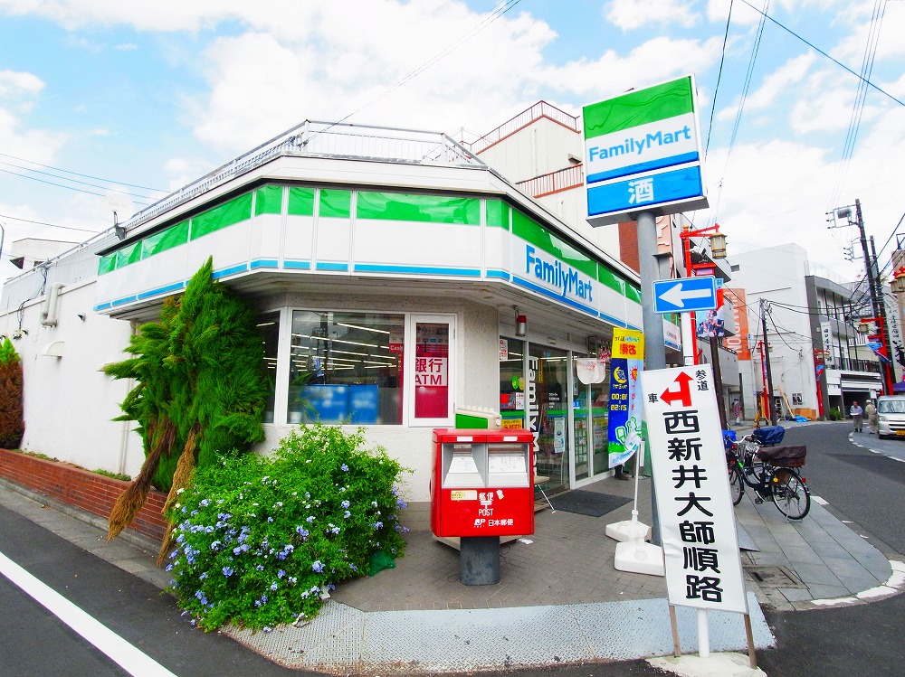コンビニ　ファミリーマート 田口屋西新井大師店（コンビニ）まで343m