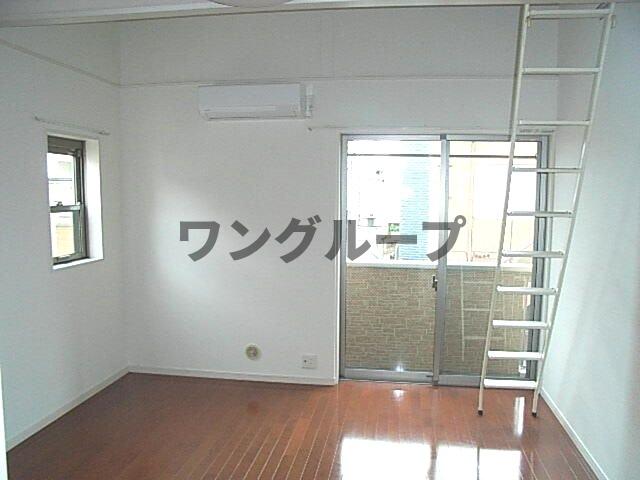 ニイホリハイツIIの居間写真