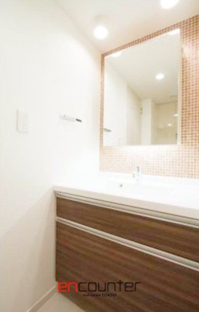 洗面設備　※同マンション別室参考写真