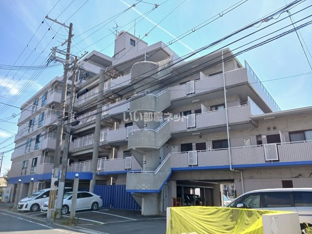 堺市西区浜寺船尾町西のマンションの建物外観