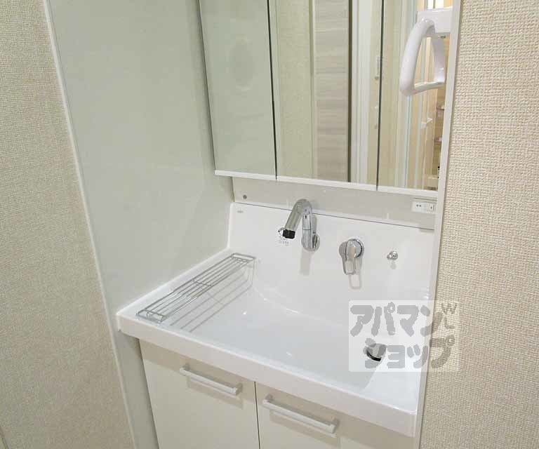 洗面設備　１０３号室の写真です。