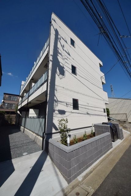 【足立区東保木間のマンションの建物外観】