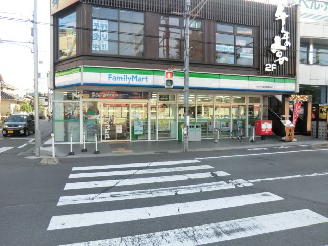 コンビニ　ファミリーマート（コンビニ）まで1594m