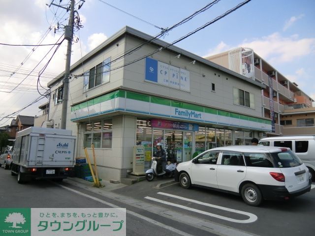コンビニ　ファミリーマート（コンビニ）まで1245m