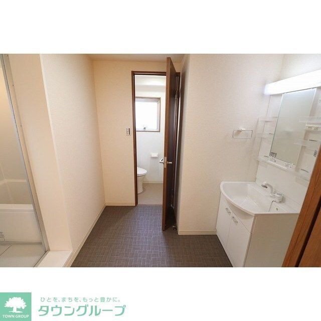 洗面設備　※写真は１０３号室のものです。