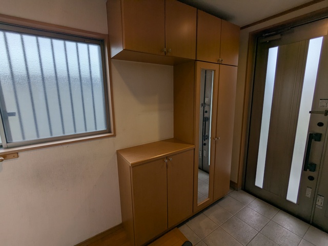 唐崎北2丁目店舗付き住宅の玄関写真