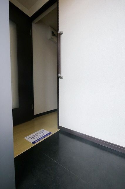 レオネクストすこやかの玄関写真