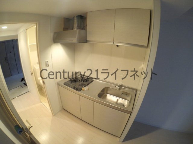 地下鉄御堂筋線 西中島南方駅 徒歩12分 9階建 築12年のキッチン写真