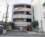 建物外観　オレンジ色が特徴的な外観です。
