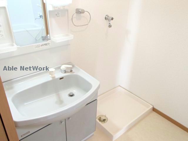 洗面設備　※同物件別部屋の写真です。