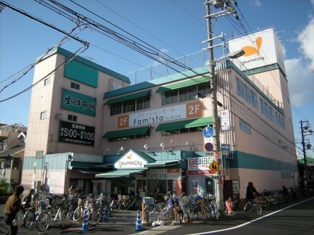 スーパー　グルメシティ千船店（スーパー）まで115m