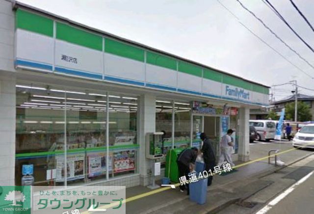 コンビニ　ファミリーマート（コンビニ）まで427m