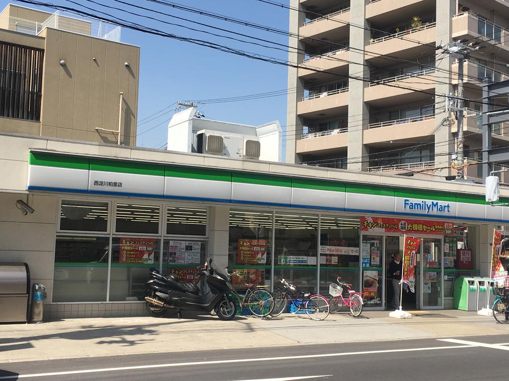 コンビニ　ファミリーマート西淀川柏里店（コンビニ）まで346m