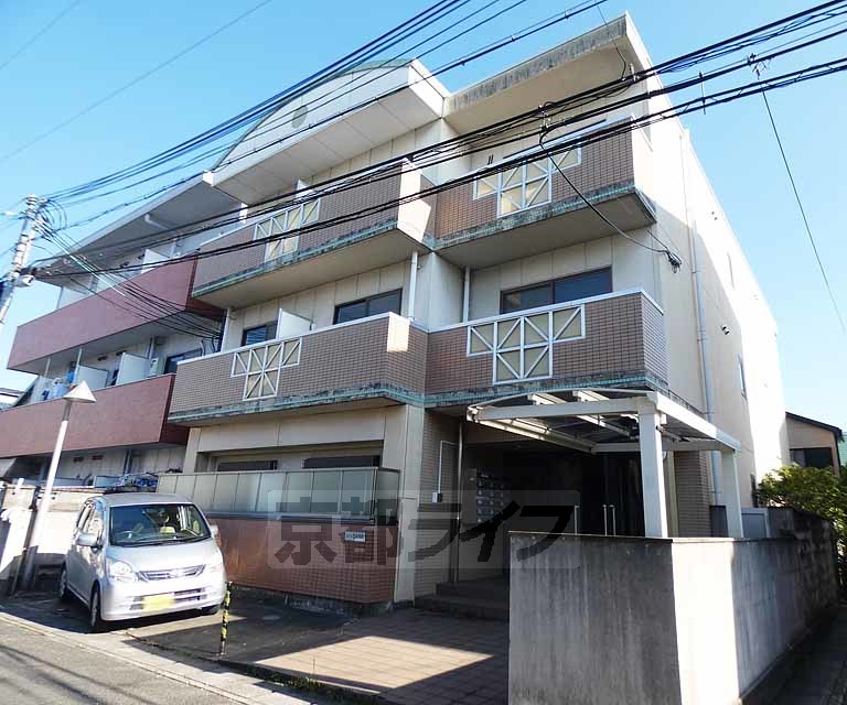 【京都市伏見区向島本丸町のマンションの建物外観】