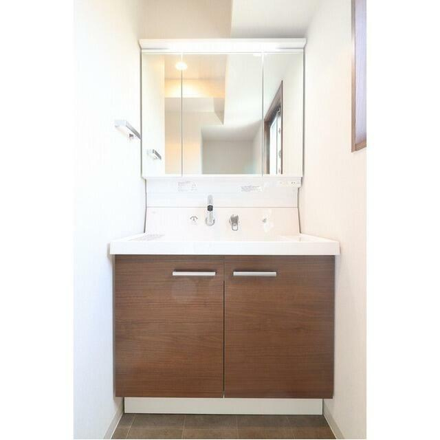 洗面設備　※別部屋の参考写真です。