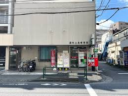 郵便局　調布小島郵便局（郵便局）まで411m