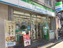 コンビニ　ファミリーマートエル本町店（コンビニ）まで63m
