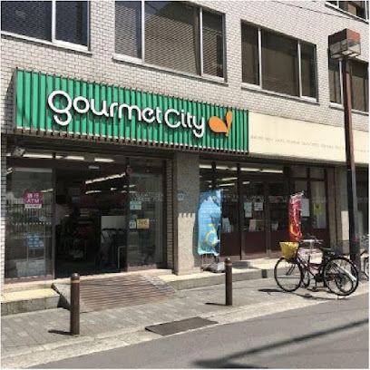 スーパー　グルメシティ南森町店（スーパー）まで395m